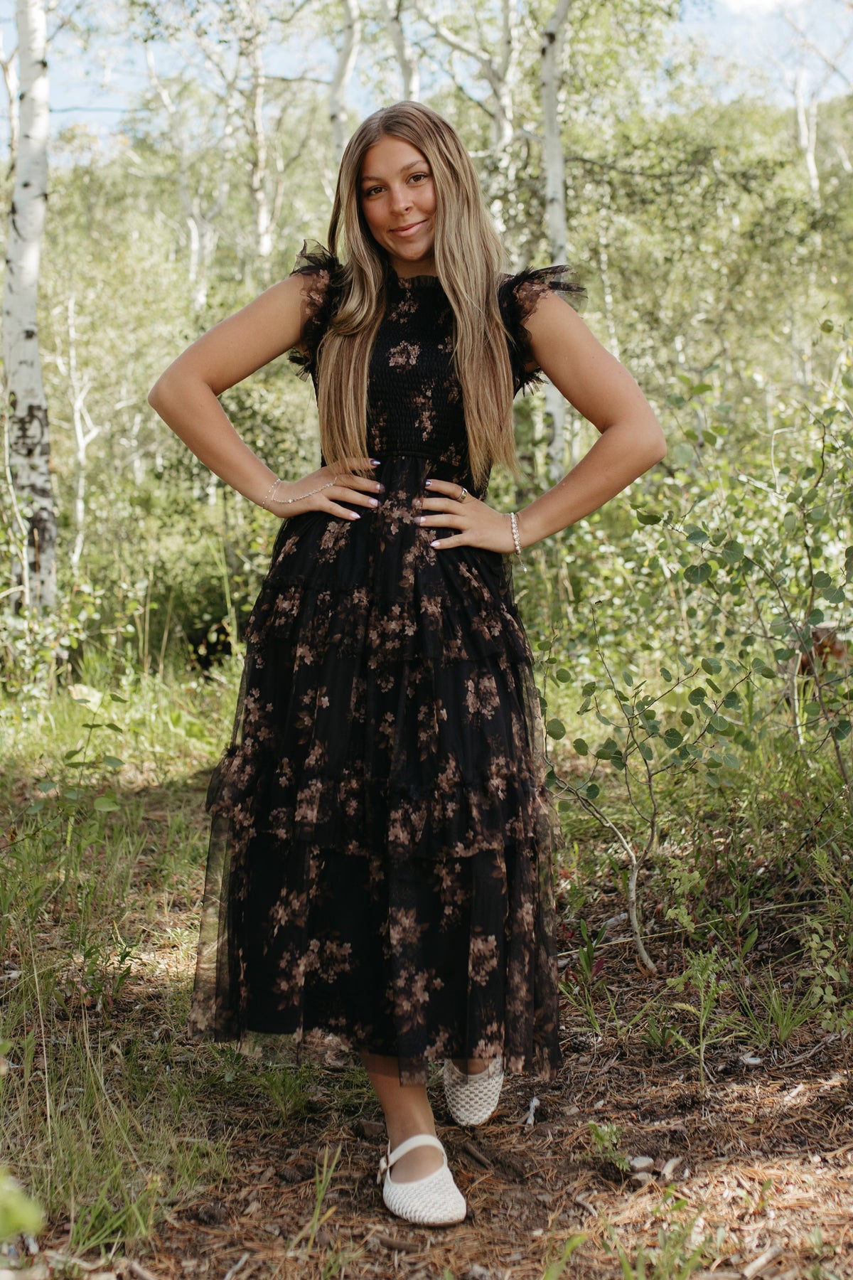 THE ADDISON FLORAL TIERED SMOCKED DRESS IN BLACK