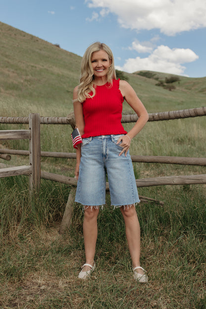 THE REMI SLEEVELESS FRILL TOP IN TOMATO RED