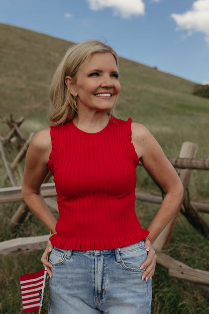 THE REMI SLEEVELESS FRILL TOP IN TOMATO RED