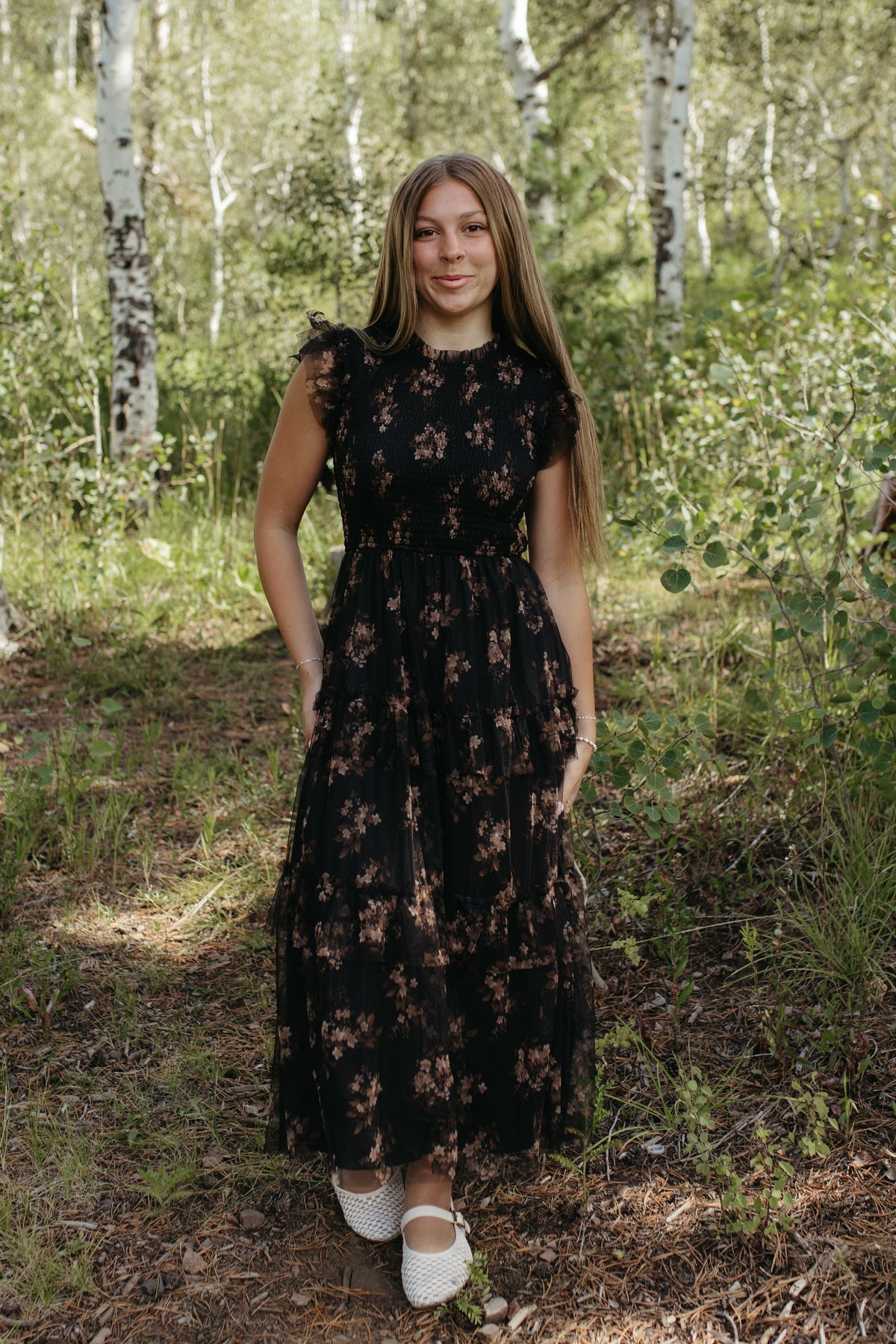 THE ADDISON FLORAL TIERED SMOCKED DRESS IN BLACK