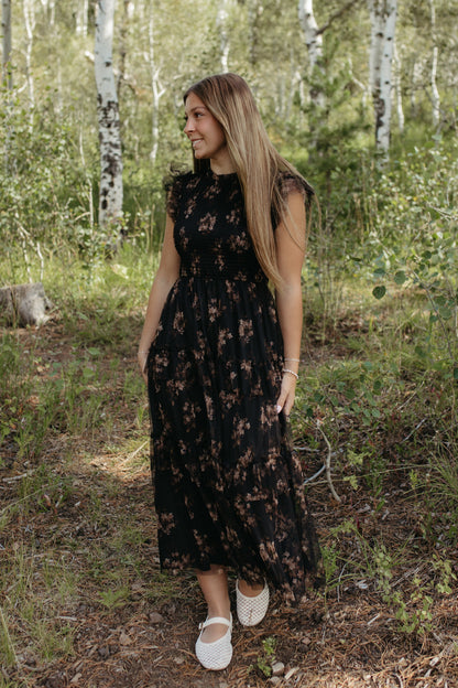 THE ADDISON FLORAL TIERED SMOCKED DRESS IN BLACK