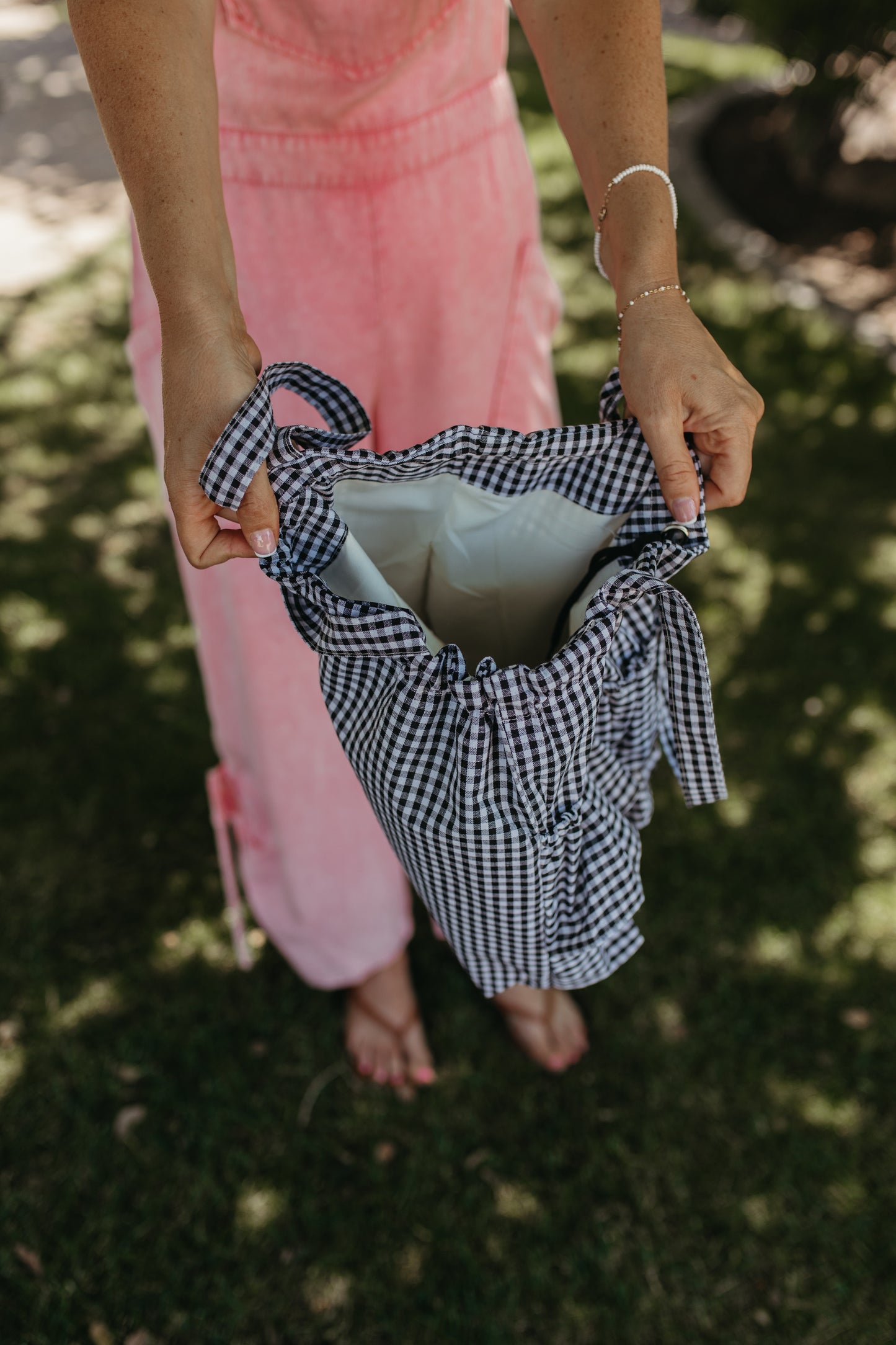 THE KAITLYN GINGHAM RUFFLE BAG IN BLACK