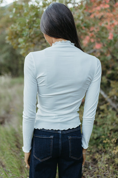 THE CORINA MERROW MOCK NECK IN CREAM