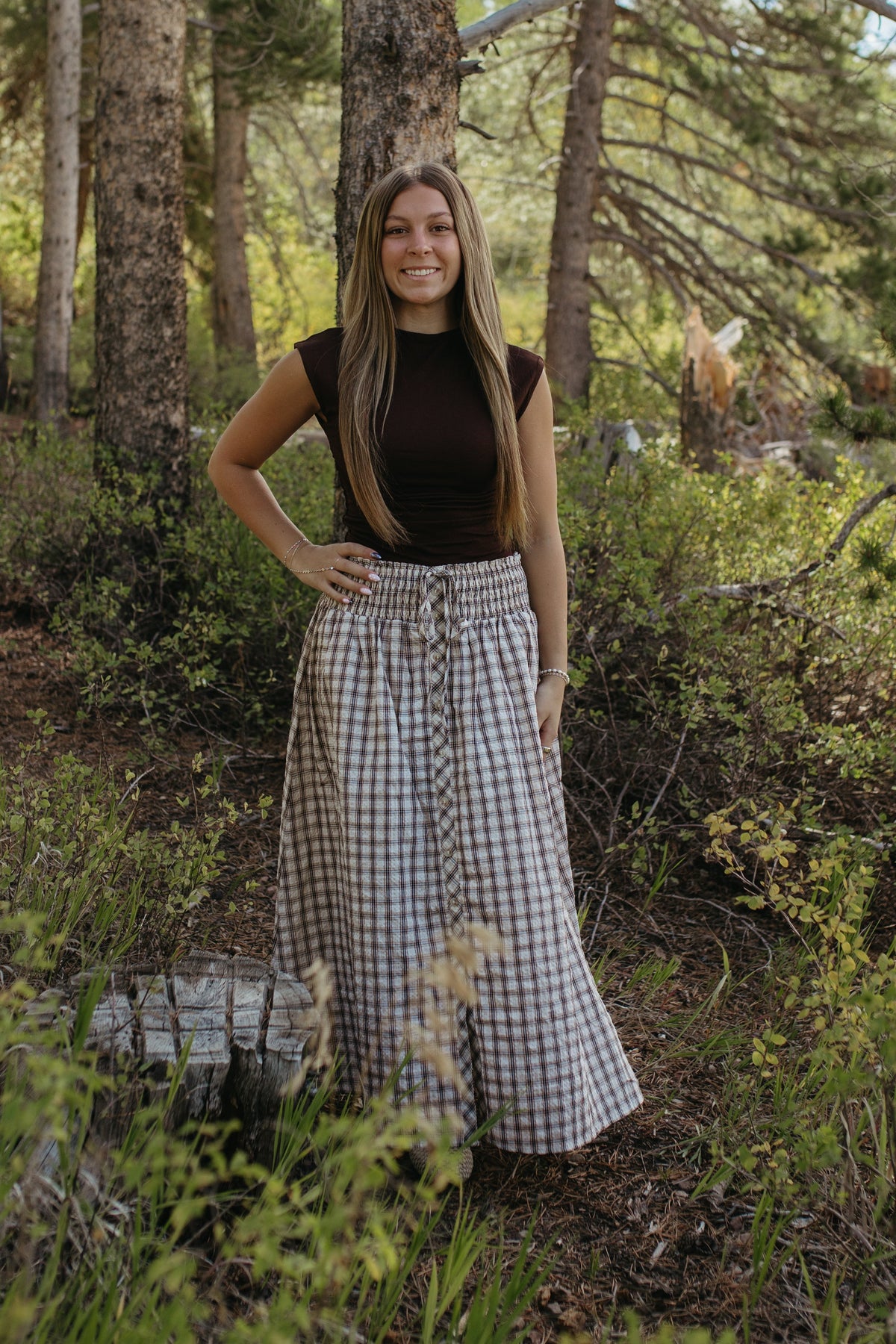 THE ARABELLA PLAID MIDI SMOCKED SKIRT IN LIGHT KHAKI