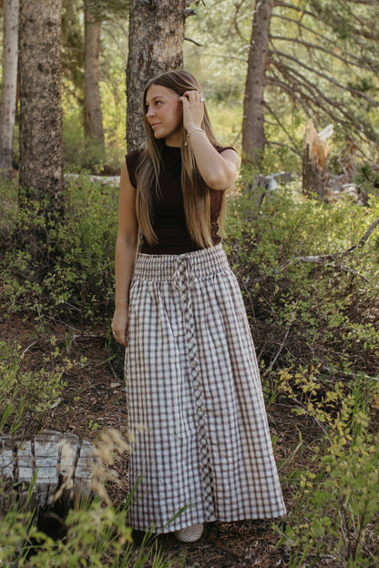 THE ARABELLA PLAID MIDI SMOCKED SKIRT IN LIGHT KHAKI
