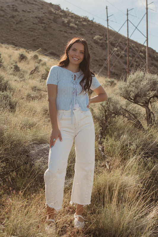 THE KAILEY TIE-FRONT KNIT TOP IN BLUE