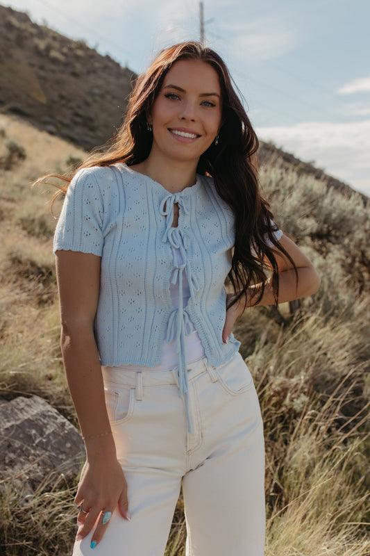 THE KAILEY TIE-FRONT KNIT TOP IN BLUE