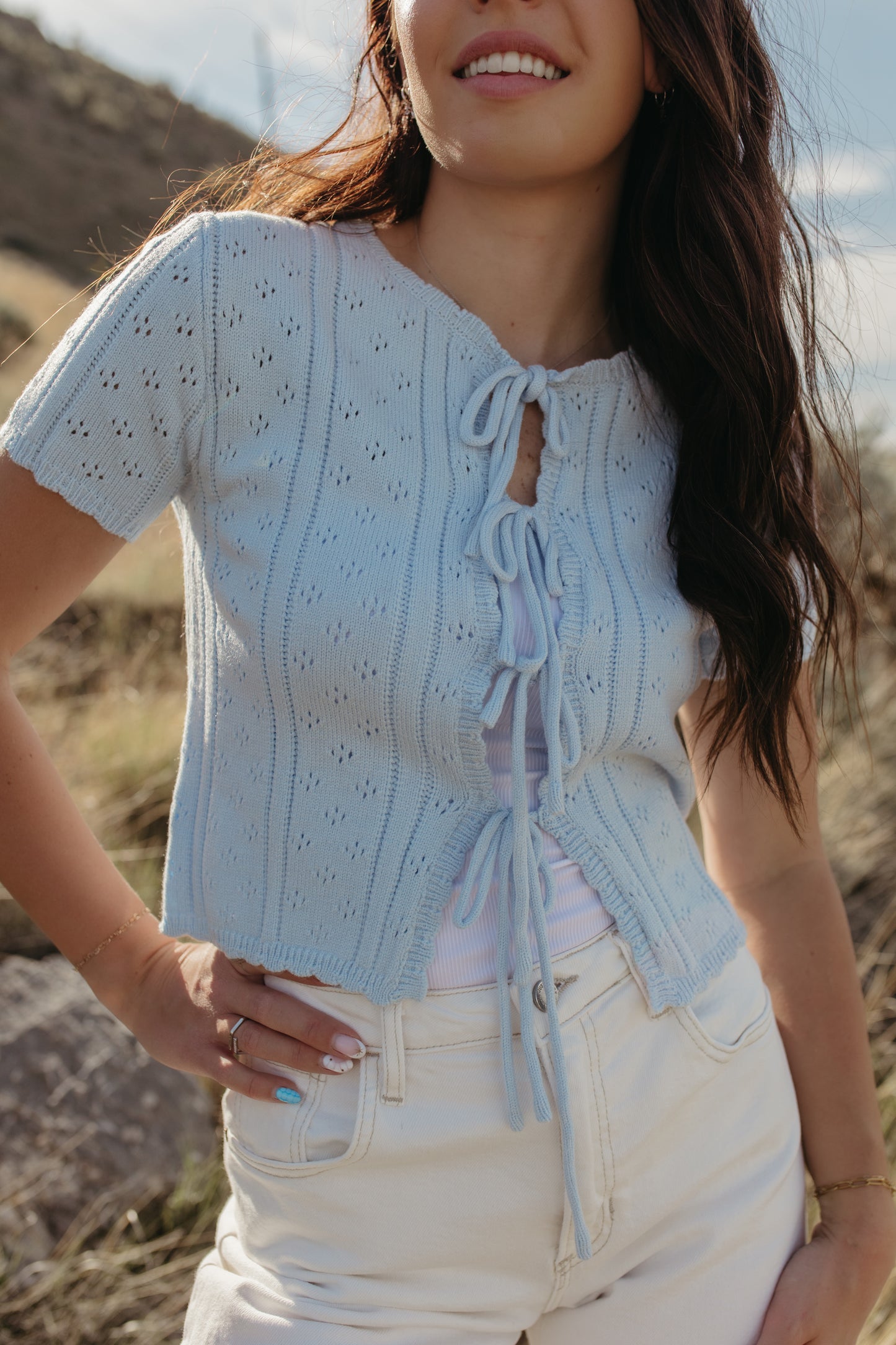 THE KAILEY TIE-FRONT KNIT TOP IN BLUE