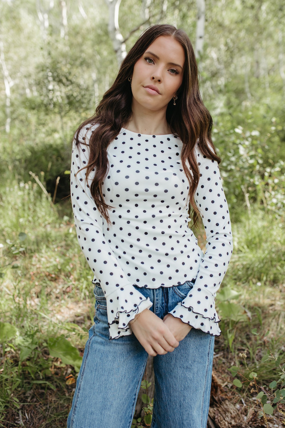 THE KARLA POLKA DOT LONG SLEEVE RUFFLE SHIRT IN WHITE