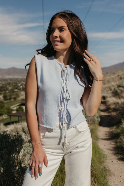 THE JUNE TIE-FRONT SCALLOPED HEM VEST IN BLUE