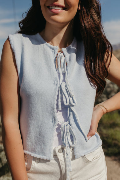 THE JUNE TIE-FRONT SCALLOPED HEM VEST IN BLUE
