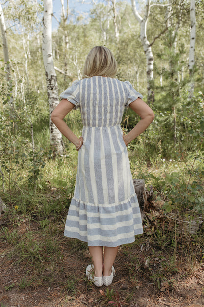 THE GWENDOLYN STRIPED TEXTURED DRESS IN BLUE