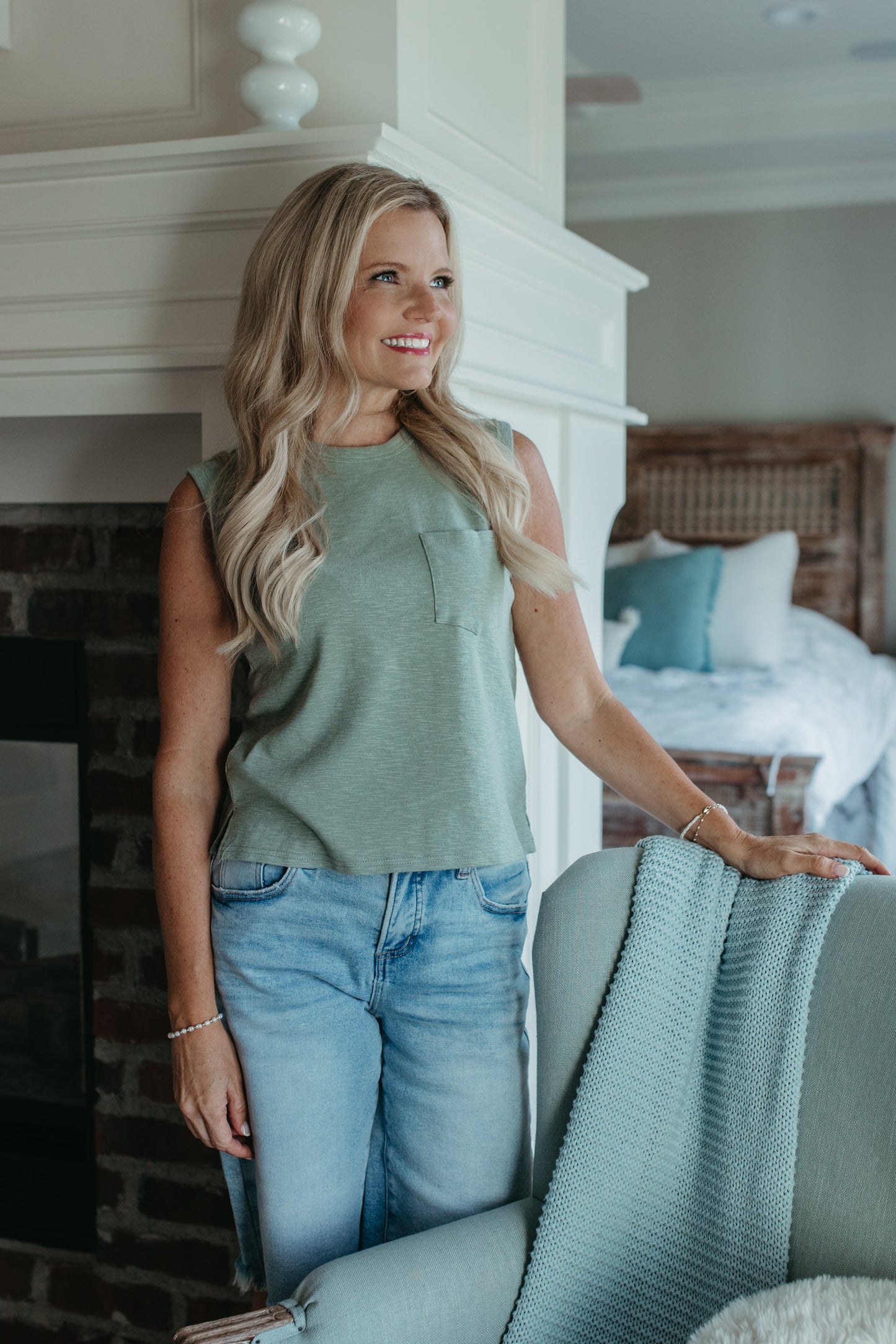 THE KHYLEE  SLEEVELESS COTTON TOP IN SAGE GREEN