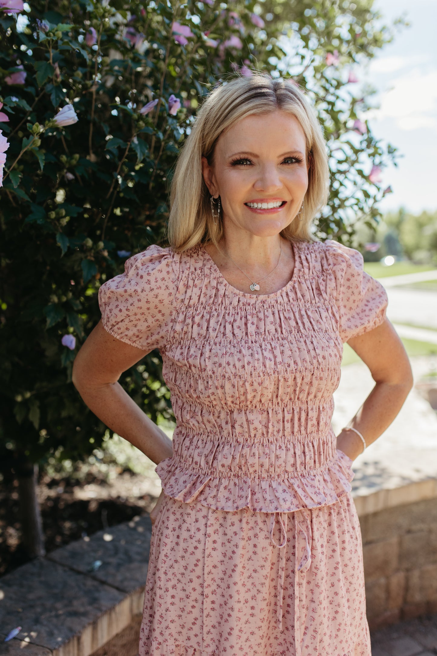 THE ZOE FLORAL SMOCKED TOP IN BLUSH