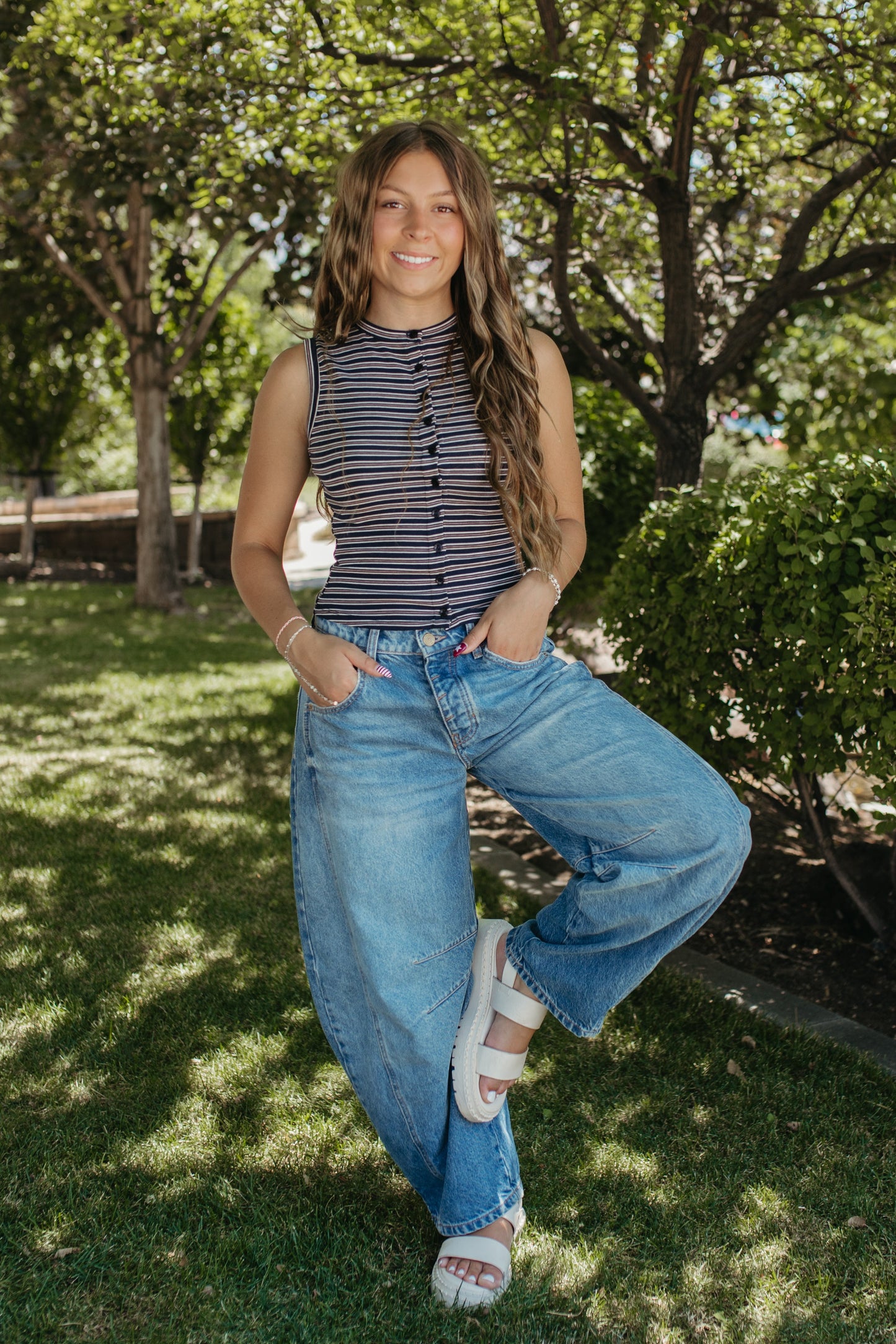 THE GUINEVERE STRIPED SLEEVELESS BUTTON TANK IN NAVY