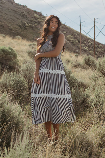 THE HARLOW STRIPED SMOCKED DRESS IN NAVY