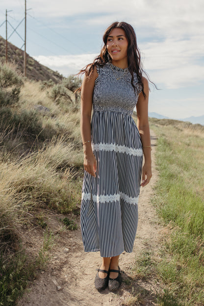 THE HARLOW STRIPED SMOCKED DRESS IN NAVY