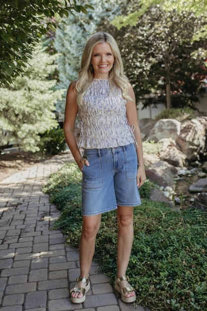 The Renata Floral Sleeveless Smocked Blouse in Lavender, photo 5 of 7