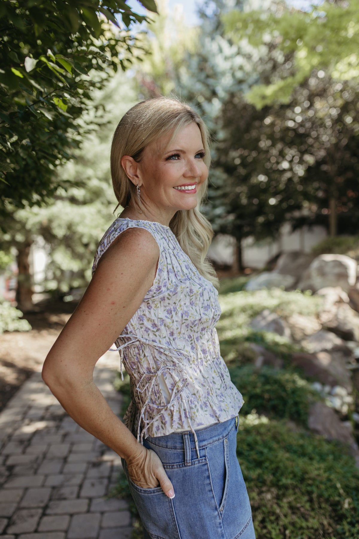 The Renata Floral Sleeveless Smocked Blouse in Lavender, photo 6 of 7