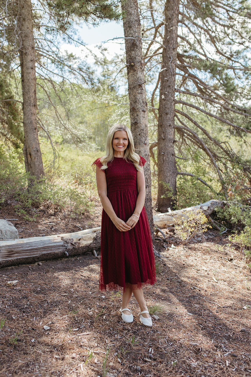 THE SEVYN POLKA DOT MIDI SMOCKED DRESS IN BURGUNDY