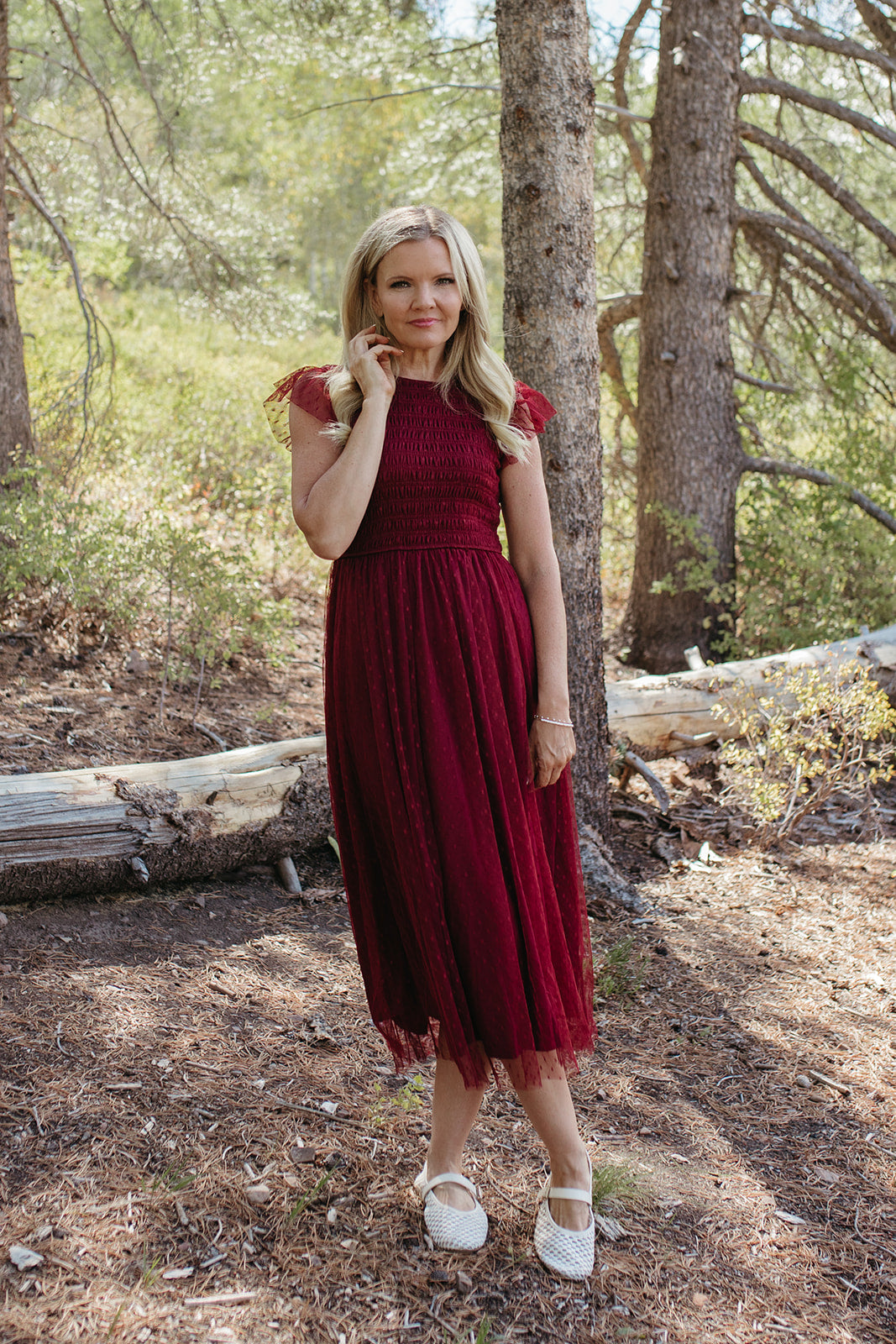 THE SEVYN POLKA DOT MIDI SMOCKED DRESS IN BURGUNDY