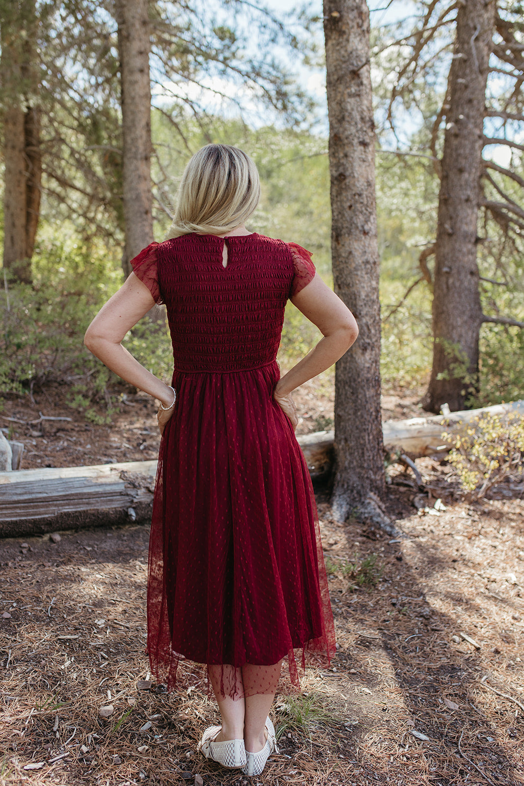 THE SEVYN POLKA DOT MIDI SMOCKED DRESS IN BURGUNDY