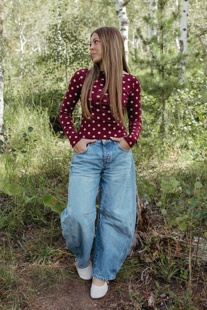 THE ROMINA POLKA DOT LONG SLEEVE KNIT TOP IN BURGUNDY