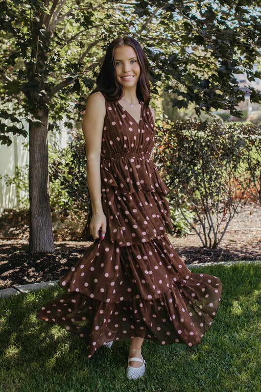 THE GRETA POLKA DOT TIERED SLEEVELESS DRESS IN BROWN