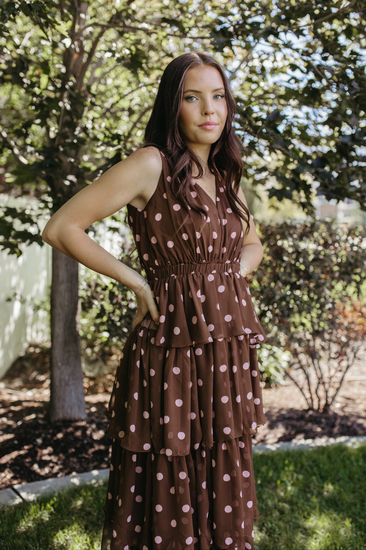 THE GRETA POLKA DOT TIERED SLEEVELESS DRESS IN BROWN