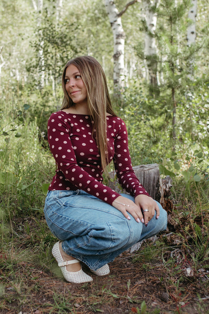 THE ROMINA POLKA DOT LONG SLEEVE KNIT TOP IN BURGUNDY