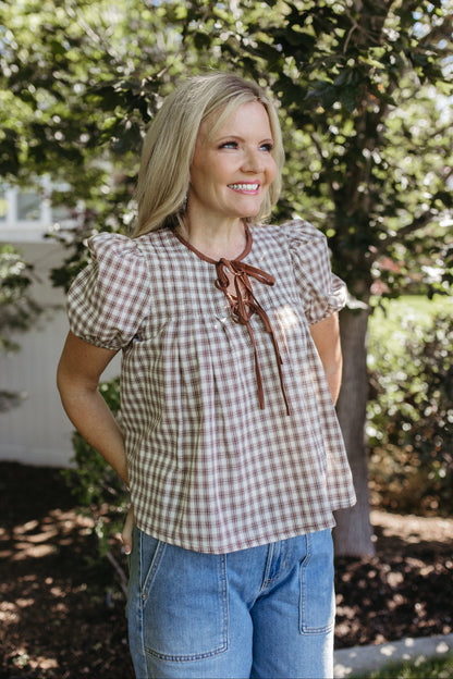THE GIULIANA PLAID SHORT SLEEVE PINTUCK BLOUSE IN BROWN