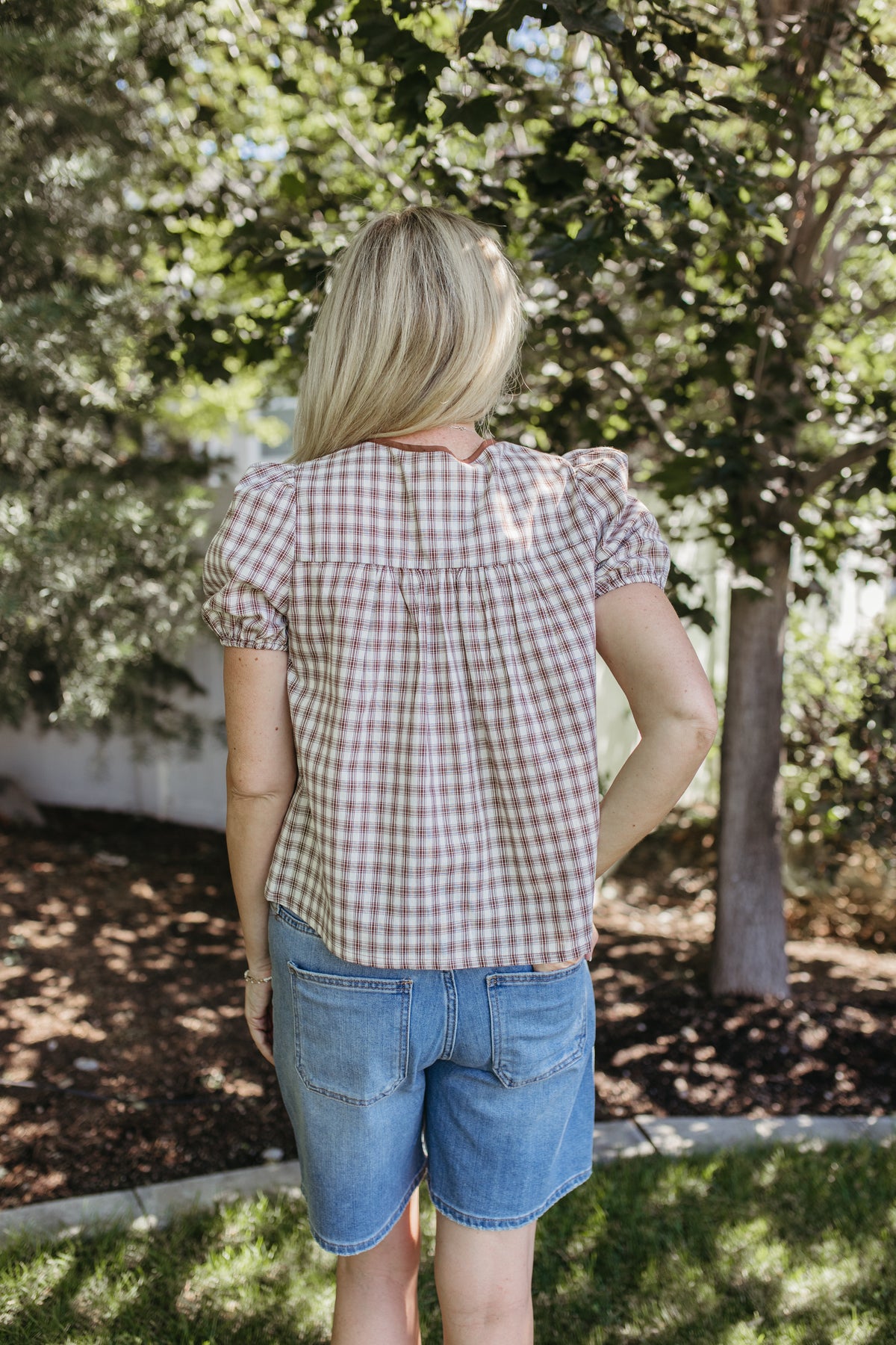 THE GIULIANA PLAID SHORT SLEEVE PINTUCK BLOUSE IN BROWN