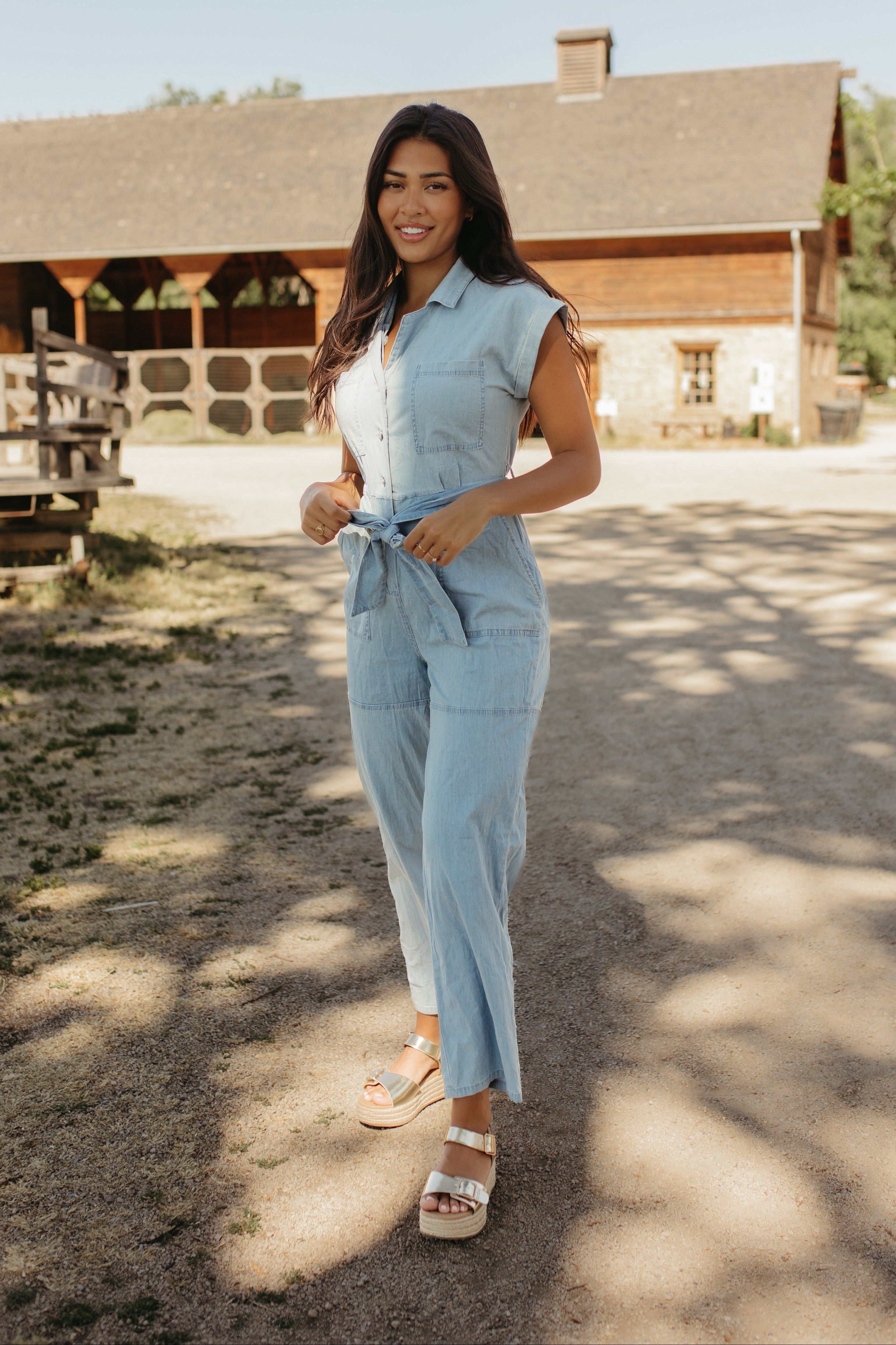 THE GEORGIA BELTED NOTCH JUMPSUIT IN LIGHT DENIM – Pink Desert