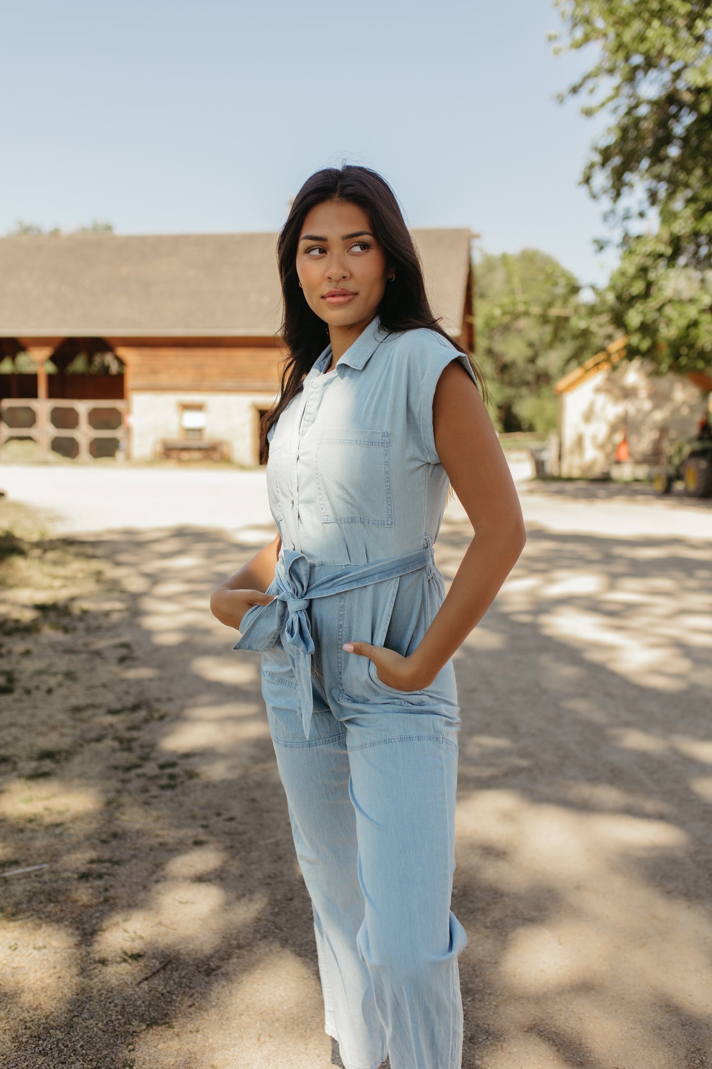 THE GEORGIA BELTED JUMPSUIT IN LIGHT DENIM