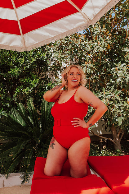 BELTED ONE PIECE IN RIBBED BOMBSHELL RED BY PINK DESERT