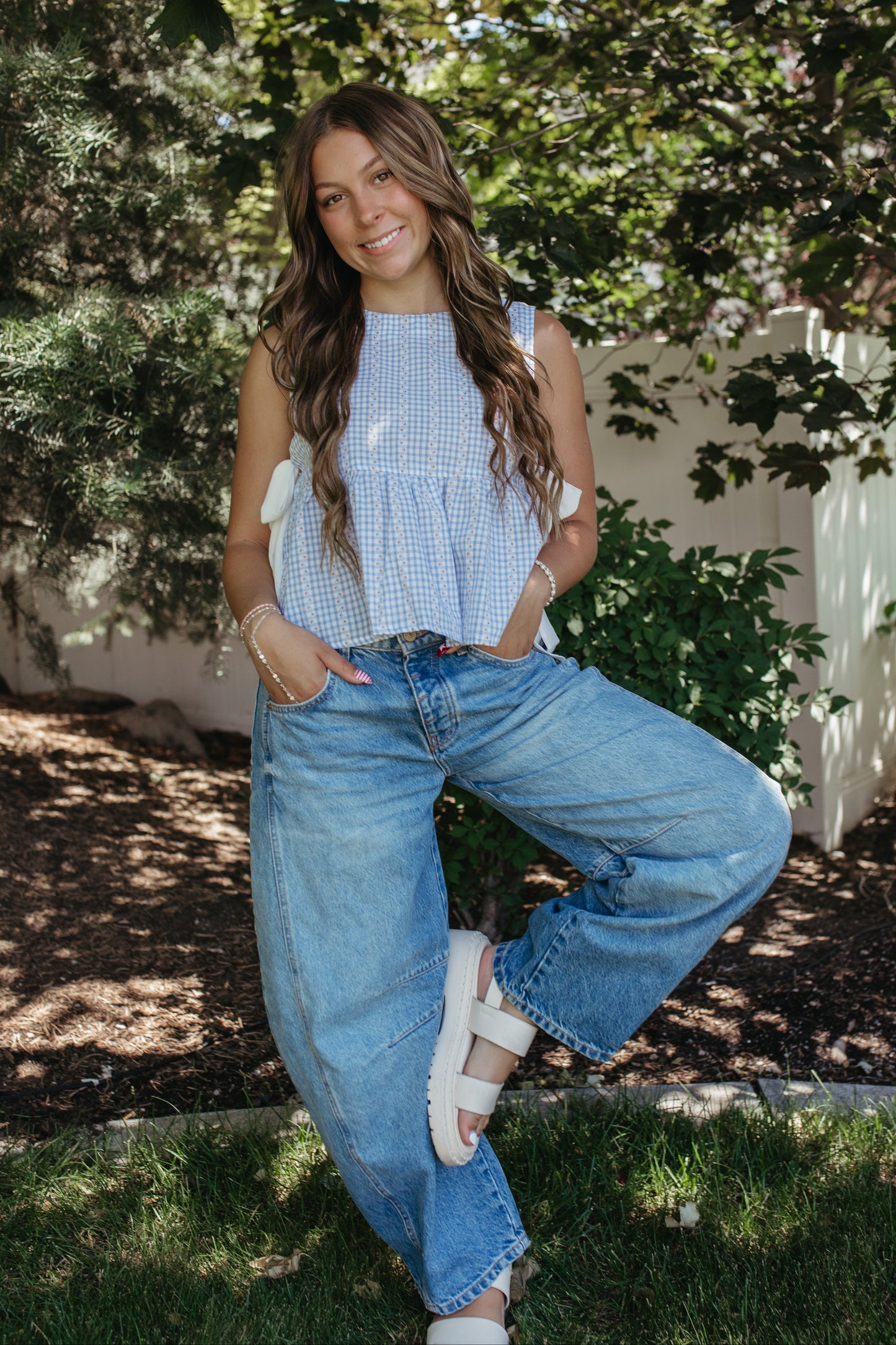 THE EVIE SKY MEADOW PEPLUM TOP IN BLUE