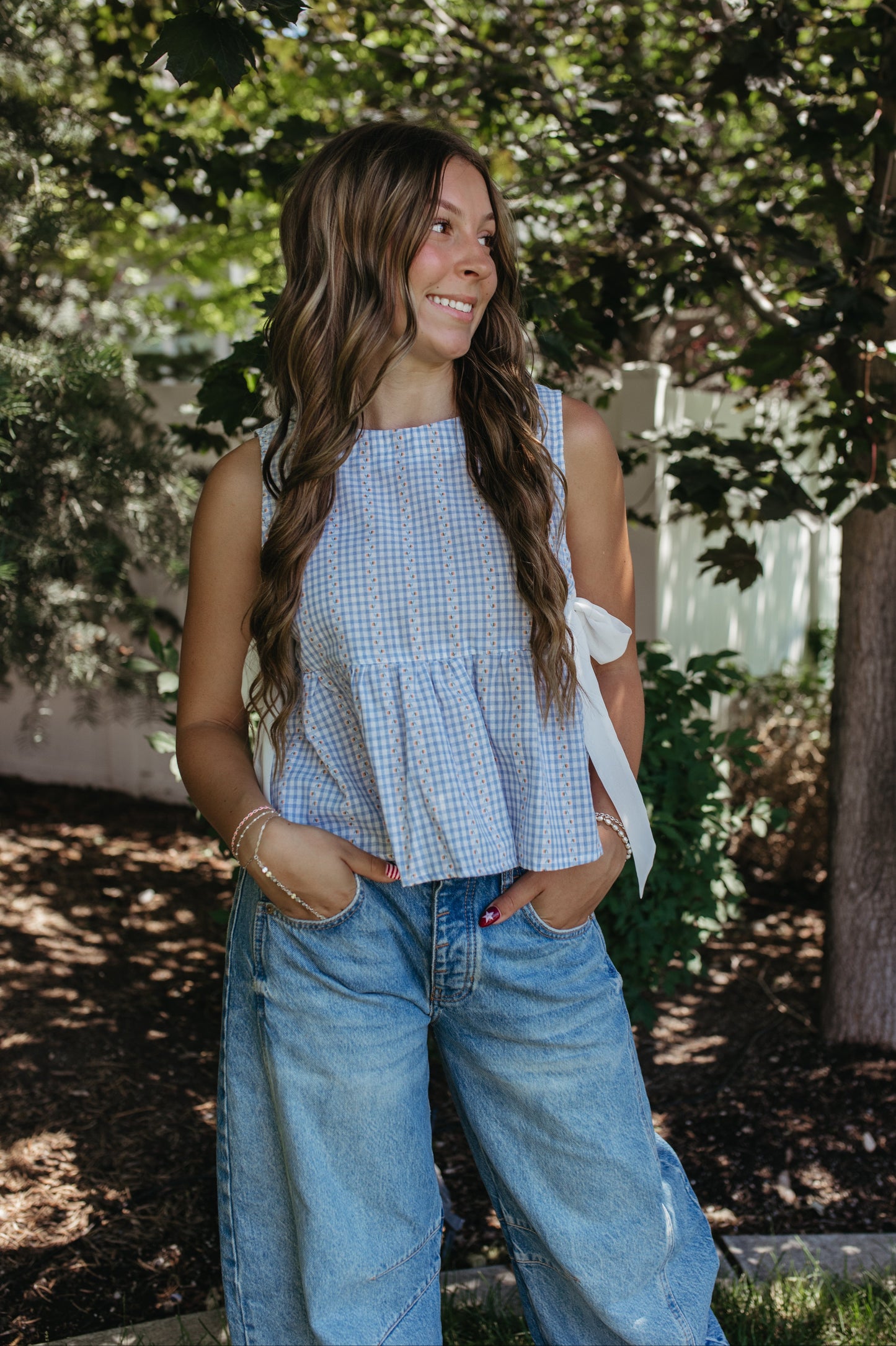THE EVIE SKY MEADOW PEPLUM TOP IN BLUE