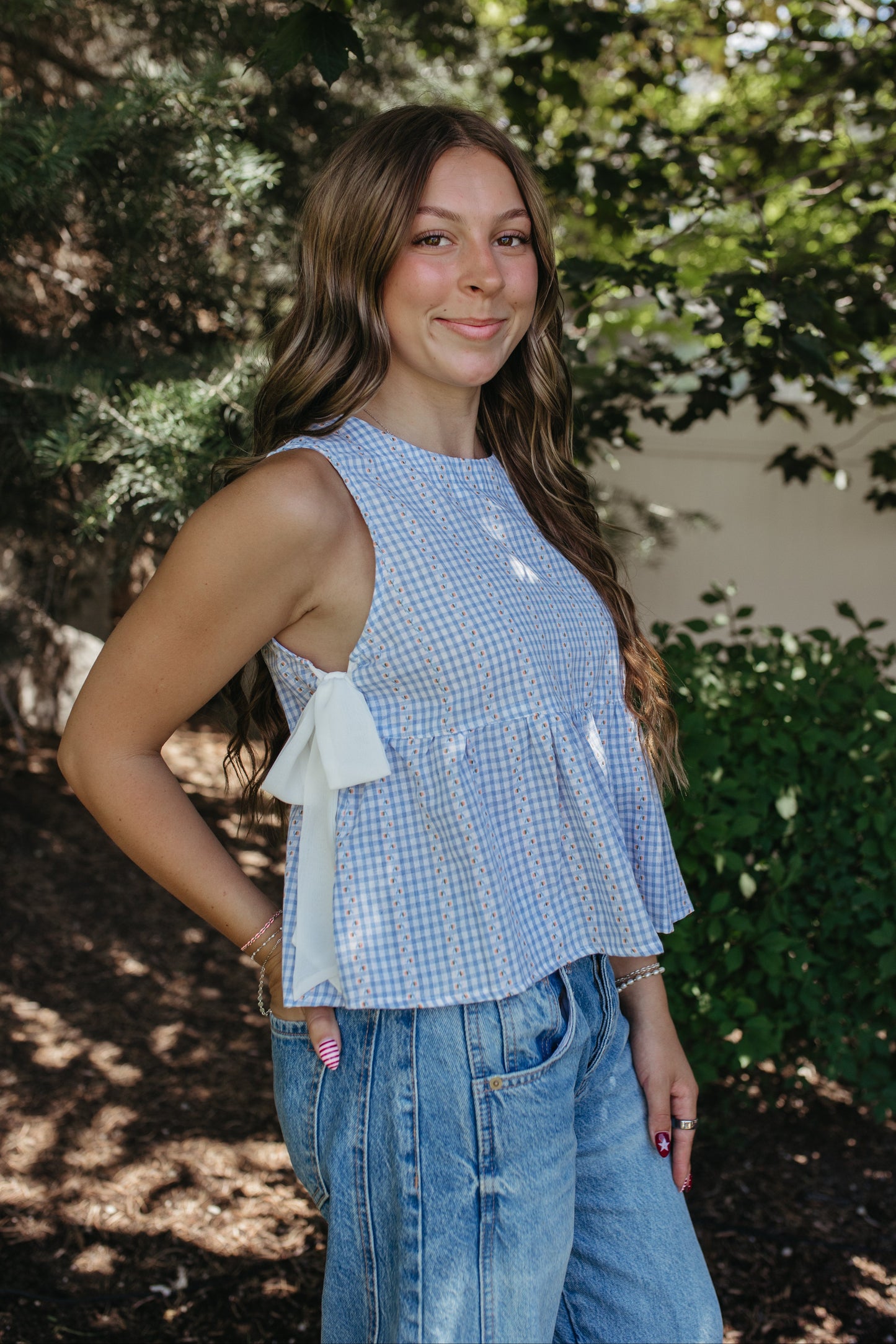 THE EVIE SKY MEADOW PEPLUM TOP IN BLUE