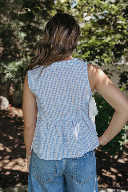 THE EVIE SKY MEADOW PEPLUM TOP IN BLUE
