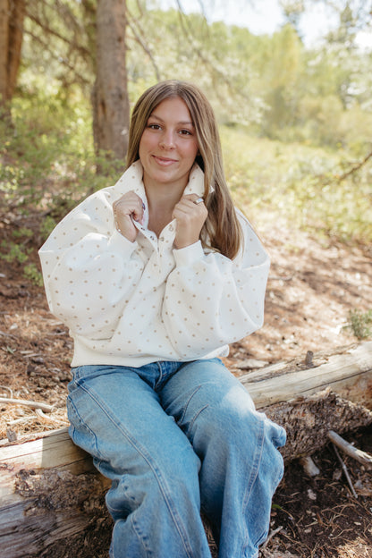 THE ELORA POLKA DOT BUTTON SWEATER IN WHITE