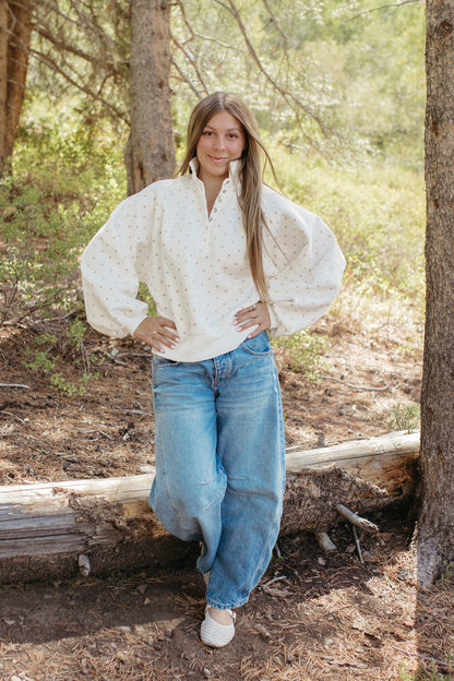 THE ELORA POLKA DOT BUTTON SWEATER IN WHITE