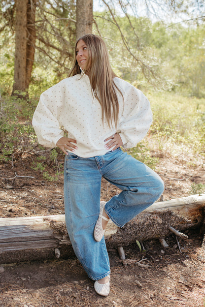 THE ELORA POLKA DOT BUTTON SWEATER IN WHITE