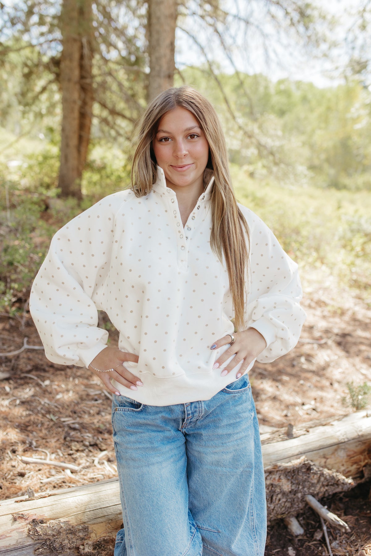 THE ELORA POLKA DOT BUTTON SWEATER IN WHITE