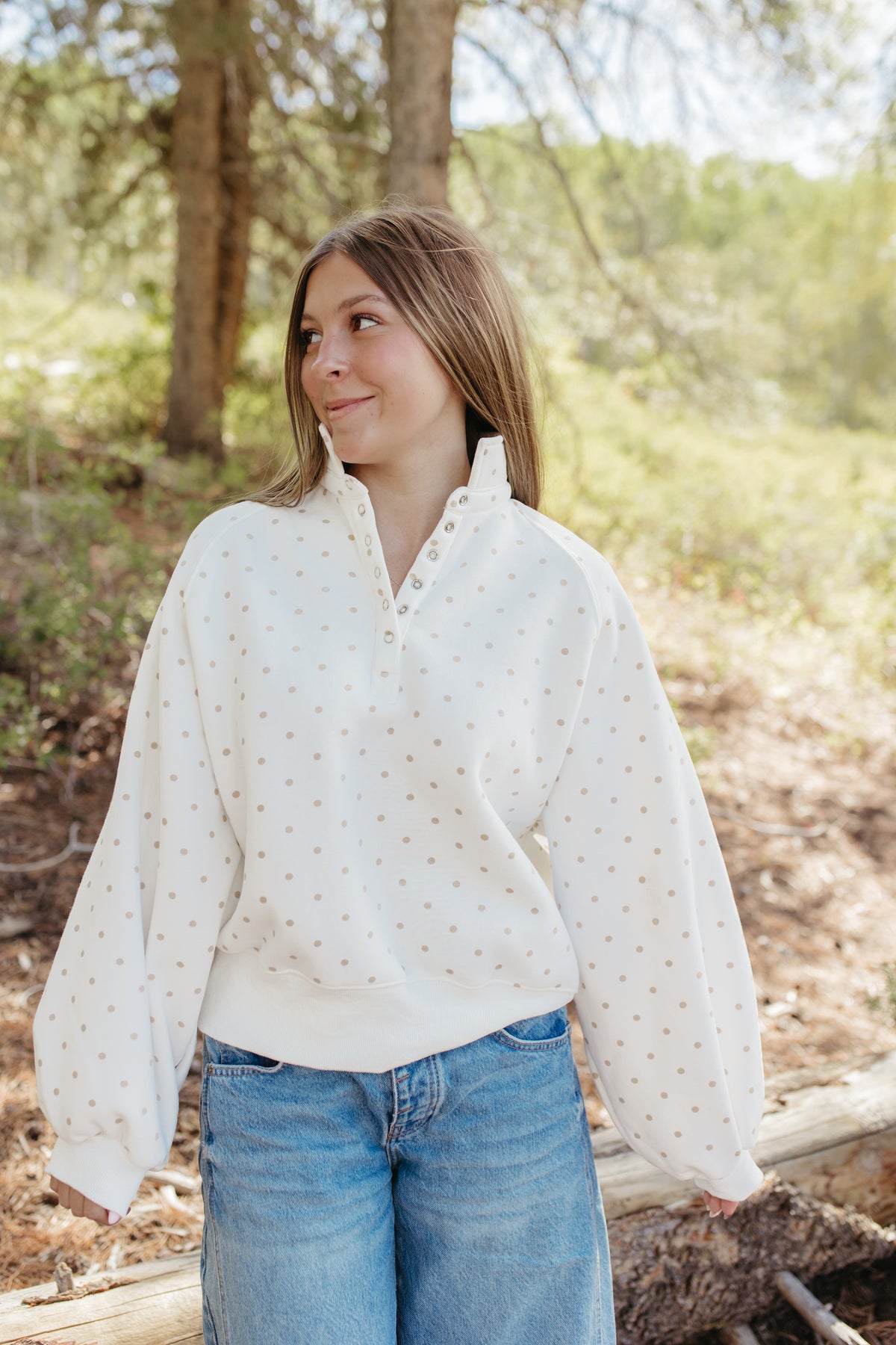 THE ELORA POLKA DOT BUTTON SWEATER IN WHITE
