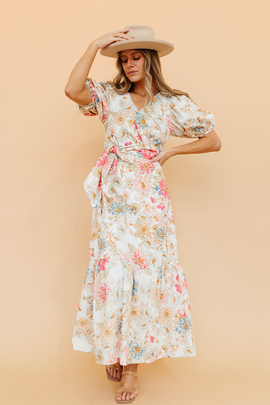 THE NIA WRAP TOP DRESS IN IVORY FLORAL