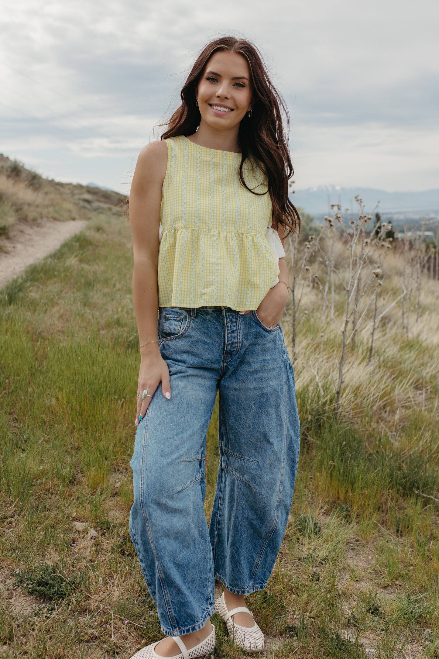 THE EVIE SKY MEADOW PEPLUM TOP IN YELLOW