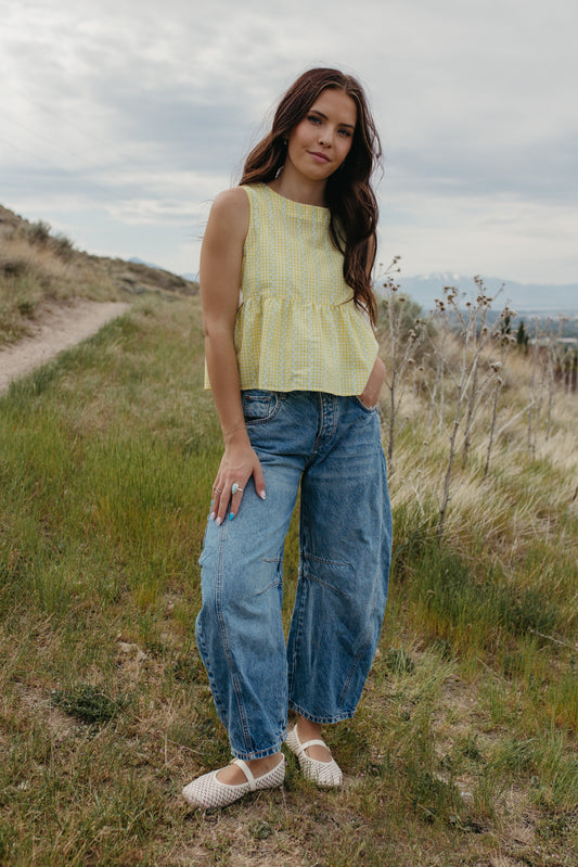 THE EVIE SKY MEADOW PEPLUM TOP IN YELLOW