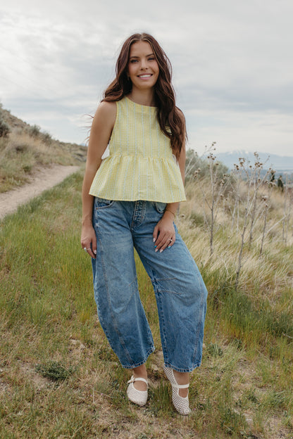 THE EVIE SKY MEADOW PEPLUM TOP IN YELLOW