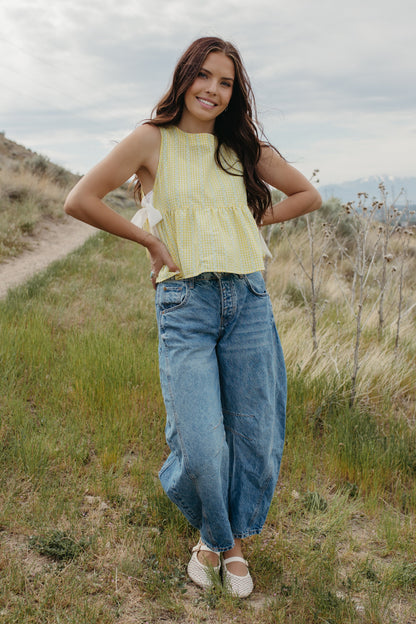 THE EVIE SKY MEADOW PEPLUM TOP IN YELLOW