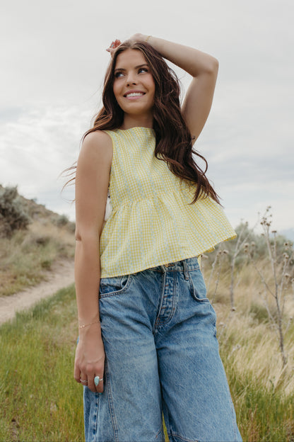 THE EVIE SKY MEADOW PEPLUM TOP IN YELLOW